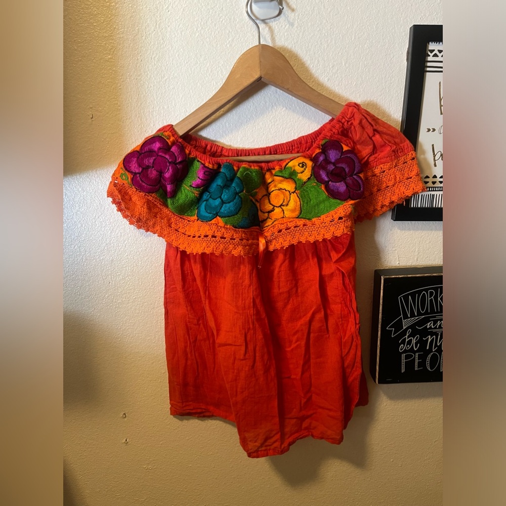 Orange medium off the shoulder woman’s floral blouse